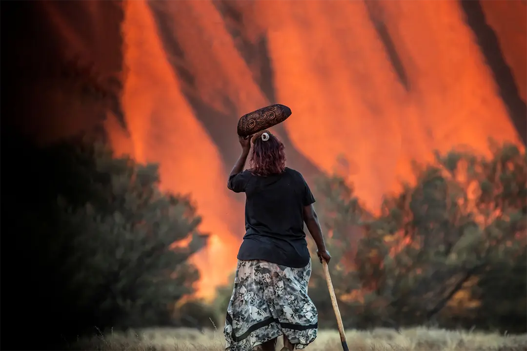 woman walking on a field