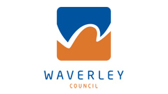 Logo of Waverley Council featuring a stylized wave in blue and orange above the text "Waverley Council," embodying their commitment to sustainability, as celebrated in their renowned Sustainability Awards.